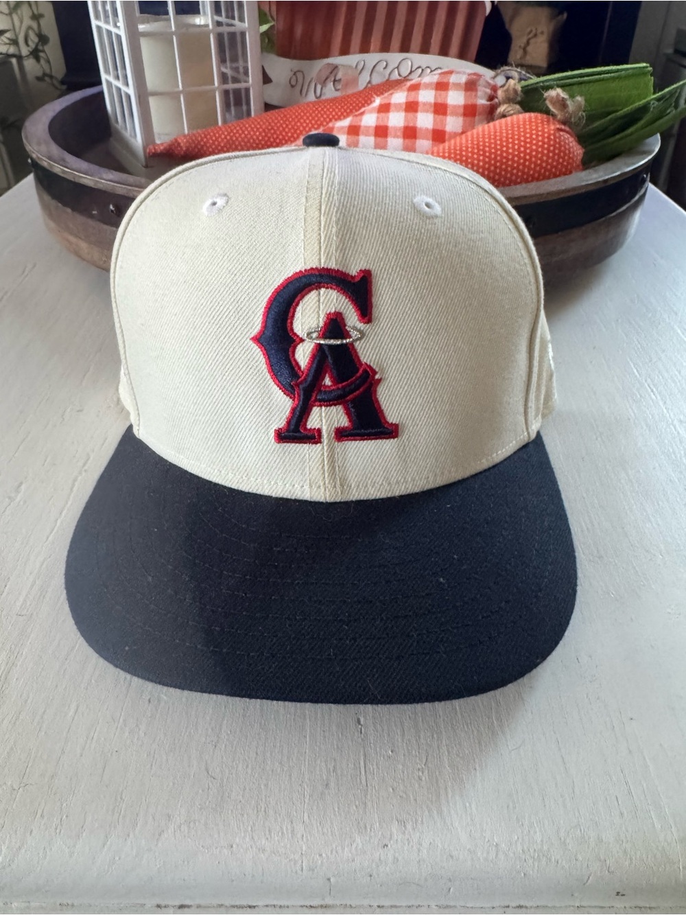 Cream and Black Baseball Cap with Red/Blue Logo